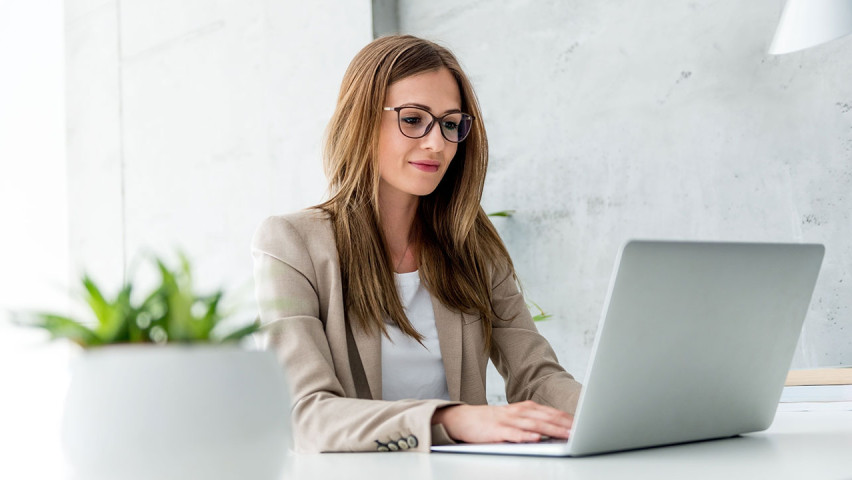 Professional woman working on laptop